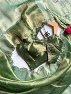 The Regalia Green Saree
